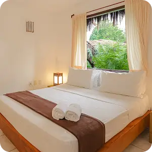 Foto da cama da suíte comfort