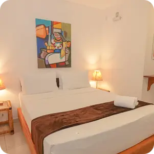 Foto da cama da suíte superior